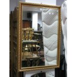 A Gilt Rectangular Shaped Wall Mirror, together with a rectangular wall mirror. (2)