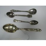 Georg Jenson; An Art Deco Style Spoon, stamped "Georg Jensen Sterling Denmark"; three further