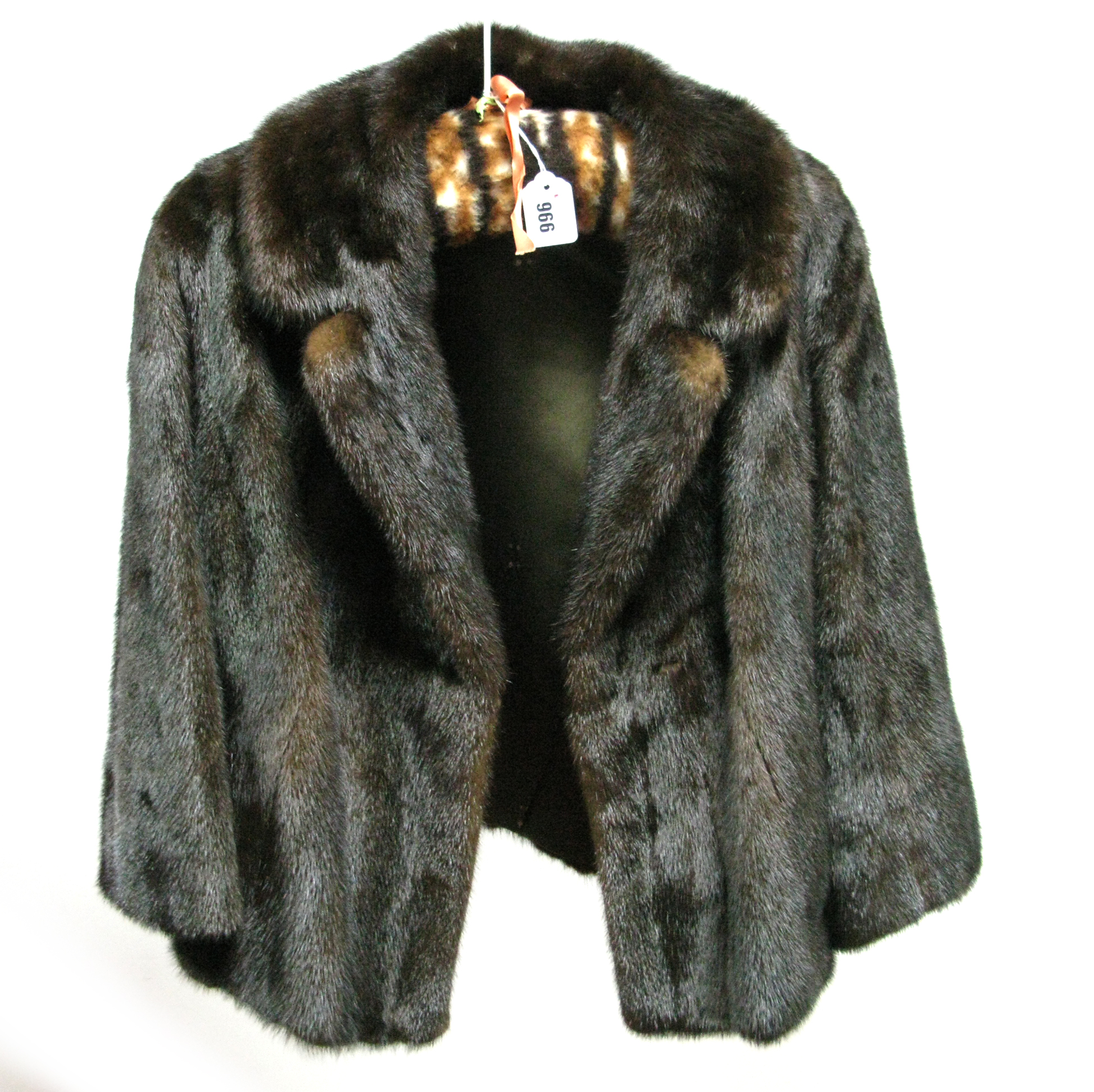 A Dark Brown Mink Cocktail Jacket, with bracelet length sleeves, side vents and rever collar, 62cm