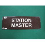 A Reproduction Enamelled Station Master Sign, measuring 46cm across, 15cm high, chipping noted.