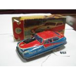 A Post War Tinplate Friction Drive Police Car, by P.N. of Western Germany, fair, boxed.