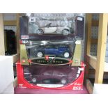 Three 1:18th Scale Diecast Model Cars, by Burago, Maisto, Motor Max, including 2002 BMW 7 Series,