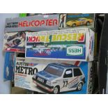 Eight Plastic Model Battery Operated, predominately radio controlled vehicles, by Corgi, Bandai