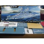 A 1/200 Scale Model Kit of The 1941 USS Arizona, by Trumpeter, appears unstarted, with brass