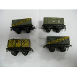 Four Pre-War Trix 'OO' Gauge Wagons, one Loco Coal, one Trix, two Bassett Lowke, all fair/good.