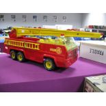 A Tonka Large Scale Steel Model Toy Fire Engine, with working retractable ladder.