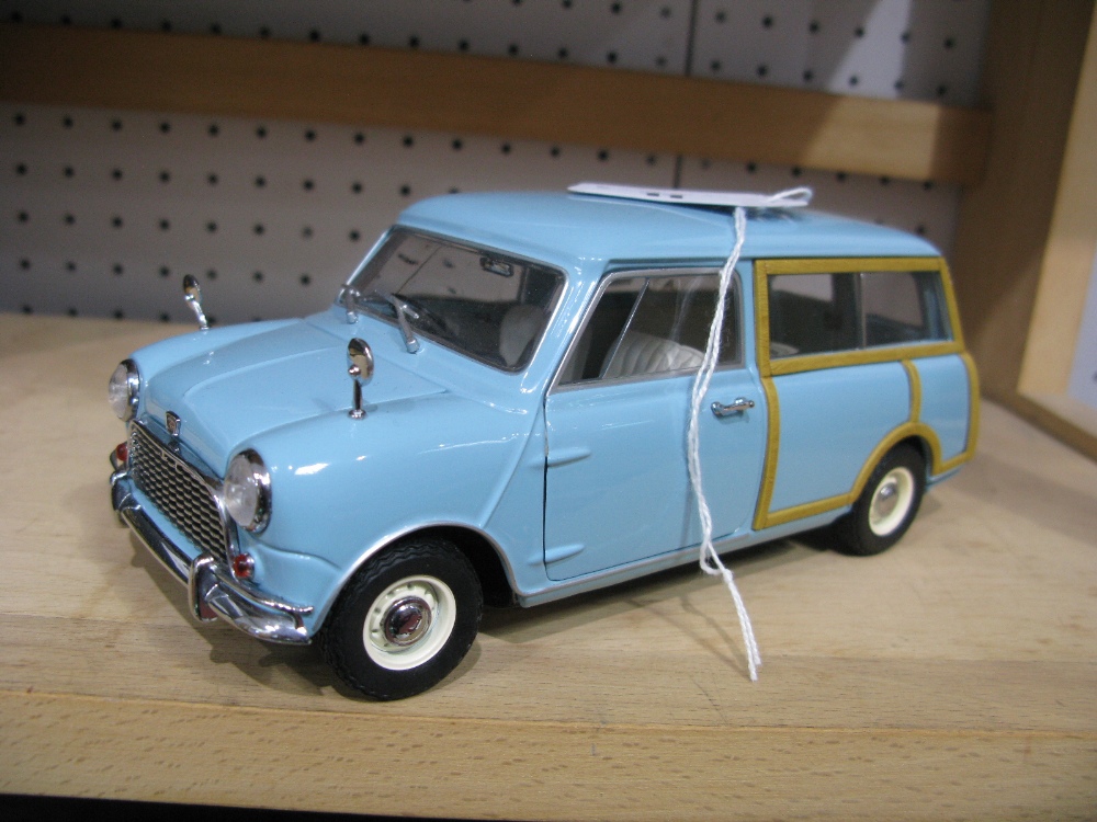 A Kyosho 1:18th Scale Diecast Model Austin Mini Countryman, pale blue in colour, passenger side wing