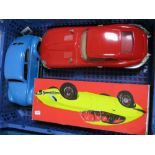 Two Tinplate Models of E Type Jaguars, 29cm long, plus a plastic bodies VW Beetle, clockwork,