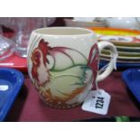 A Moorcroft Pottery Mug, painted with the 'Good Morning' (Rooster) pattern, designed by Nicola