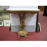 A Marble Topped Side Table, on gilt pedestal, having four paw feet.