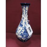 A Moorcroft Pottery Vase, painted in the 'Viola' pattern, shape 80/6, impressed and painted marks,