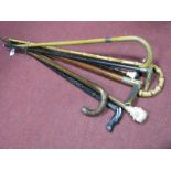 Eight Early XX Century and Later Walking Sticks, including ivory and silver hallmarked pommels,
