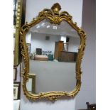 An Italian Gilt Framed Wall Mirror, with fanned cresting 83 x 58