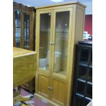 Morris Furniture Company Light Oak Display Cabinet, with upper glazed doors, 90cm wide.