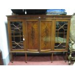 An Edwardian Inlaid Mahogany Display Cabinet, with low back, twin panelled cupboard doors flanking