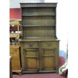 An Oak Dresser,with knulled decoration to planked rack and twin drawers, 96cm wide.