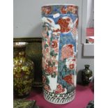 A XIX Century Imari Pottery Vase of Cylindrical Form, with allover floral decoration, and vase of