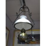 A Brass Oil Ceiling Light converted to Electric, with iron frame and white glass shade.