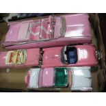 A Maisto 1:12 Scale Pink Cadillac Eldorado Biarritz 1969 Diecast Model, a Solido 1955 Pink Cadillac,