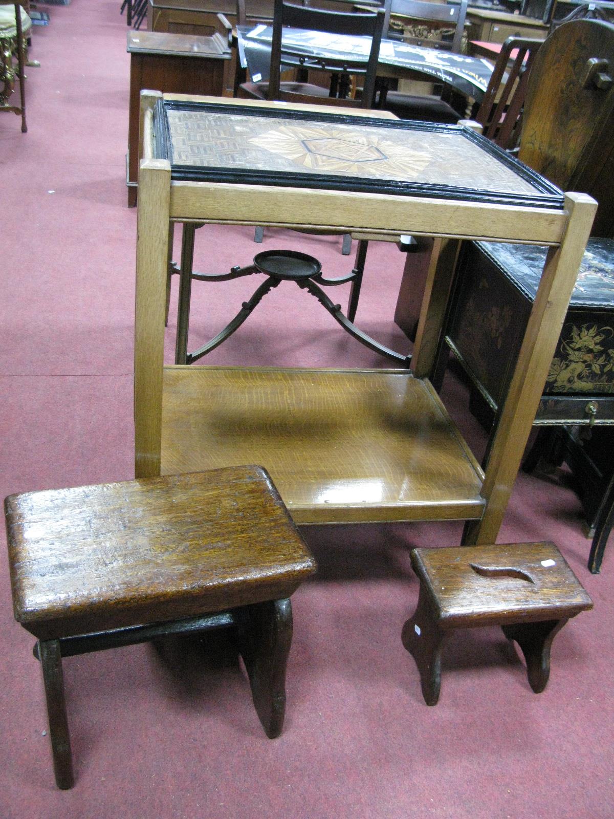 An Oak Two Heights Tea Trolley, the removable top tray with parquetry decoration; and two stools (