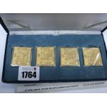 Stamp Ingots, 1988 Calgary Olympics related, 22k gold plate on solid silver in case (4)