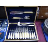 A Highly Decorative Set of Mother of Pearl Handled Dessert Knives and Forks, in a plush lined fitted