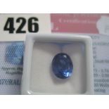 An Oval Cut Sapphire, unmounted, with a Global Gems Lab Certificate card, stating carat weight 7.