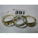 An 18ct Gold 'Keeper' Style Ring, an eternity band and another ring. (3) (damages)