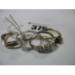 A Modern 9ct Gold Inset Wishbone Ring, a 9ct gold two row illusion set dress ring, stamped "0.10", a
