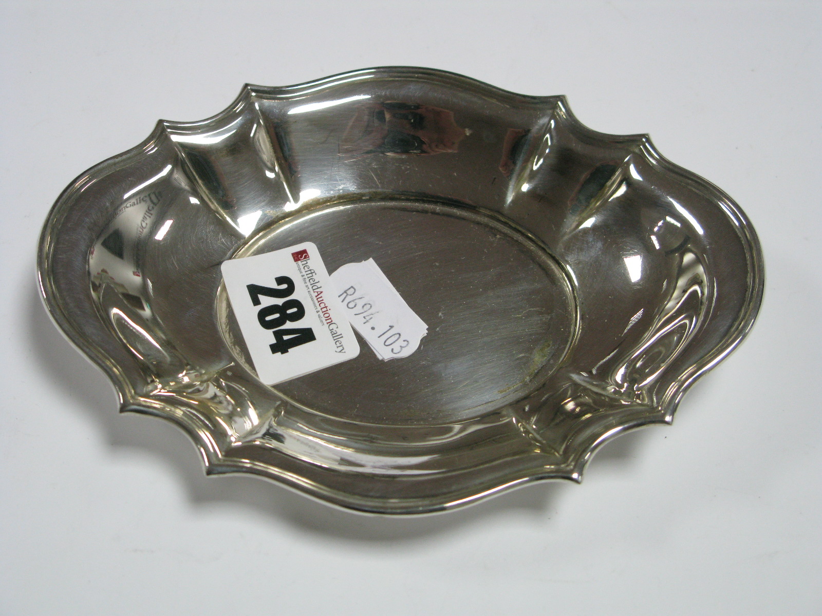 A Hallmarked Silver Trinket Dish, of shaped oval form, 14.7cm wide.