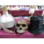 Dunn & Co Top Hat, aluminium helmet, model skull.