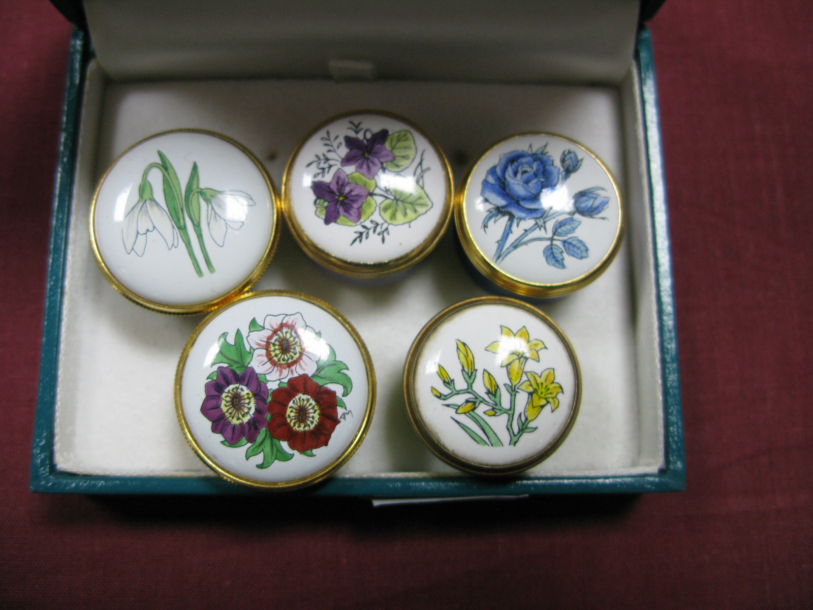 Five Miniature Crummles Enamel Trinket Boxes, each with floral decoration. (5)
