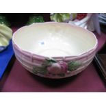 A Clarice Cliff Newport Pottery Bowl, moulded decoration on a pink/cream ground base numbered 883.