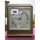 An Elliott Mahogany Cased Mantel Clock, labelled 'Burrell Sheffield', on brass squat bun feet.