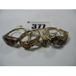 A 9ct Gold Victorian Style Dress Ring, oval graduated set, between openwork setting and textured