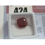 A Cushion Cut Ruby, unmounted, with a Global Gems Lab Certificate card stating carat weight 8.55 (