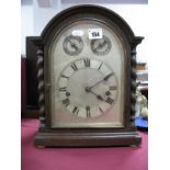 A 1920's Oak Dome Cased Bracket Clock, with barley twist pillars, Westminster chime movement slow/