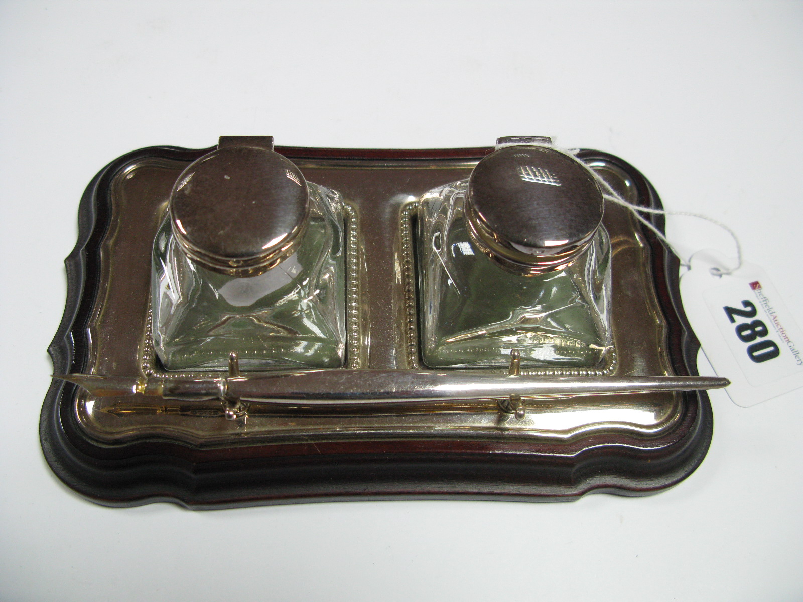 A Modern Hallmarked Silver Mounted Double Inkwell Stand, with pen rest and antique style dip pen.