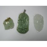 A Carved Oriental Jadeite Pendant, another similar of elephant design and one other. (3)