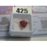 A Trillion Cut Ruby, unmounted, with a Global Gems Lab Certificate card stating carat weight 6.05 (