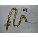 A 9ct Gold flat Link Curb Chain, suspending an ornate crucifix pendant, stamped "9ct".