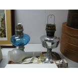 A French Cast Metal Based Oil Lamp, with turquoise well, chrome oil lamp plus accessories.