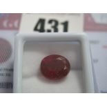 An Oval Cut Ruby, unmounted, with a Global Gems Lab Certificate card stating carat weight 7.95 (