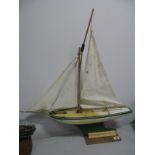 A Model Star Yacht, 'The Northern Star', on stand.