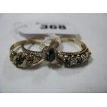 A Modern 9ct Gold Cluster Ring, oval four claw set, within openwork inset border and shoulders,