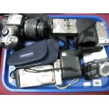 Seven Digital Cameras, including Canon EOS 300D digital SLR camera with 18-55mm lens, Panasonic