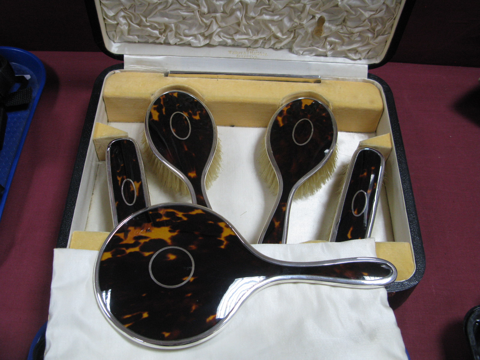 A Hallmarked Silver and Tortoiseshell Backed Six Piece Dressing Table Set, Walker & Hall, Birmingham