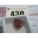 A Trillion Cut Ruby, unmounted with a Global Gems Lab Certificate card stating carat weight 6.60 (