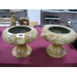 A Pair of XIX Century Salt Glazed Pedestal Urns, of circular form, each with twin lion handles and
