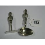 A Novelty Vintage Baby's Spoon and Pusher, each with soldier handle, stamped "EPNS" "BCM PRIAUR Rd